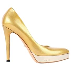 Tacchi con tacco Gucci in pelle oro