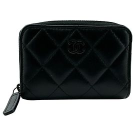 Monedero redondo de cuero negro Chanel