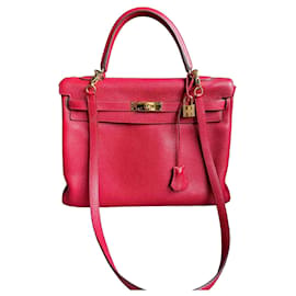 Hermès Kelly 35 in pelle Togo vermiglio con finiture oro