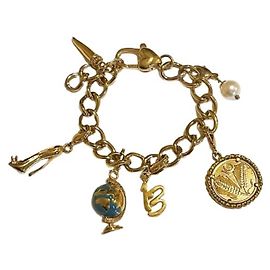 Dolce & Gabbana Rare beautiful DOLCE&GABBANA golden bracelet with globe and other charms