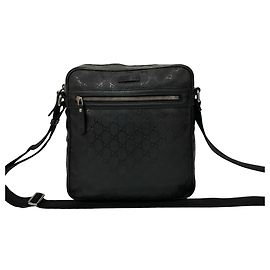 Sac messager en cuir imprimé du logo GG de Gucci