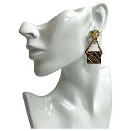 Orecchini a clip in oro matelassé Coco Mark di Chanel