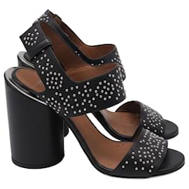 Sandali con tacco a blocco e cinturino alla caviglia con borchie in pelle nera di Givenchy