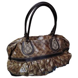 Gucci Handtasche aus beigem und braunem Monogramm-Canvas