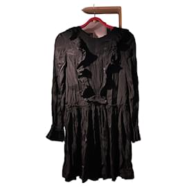 Vestido negro Sandro con volantes y pliegues
