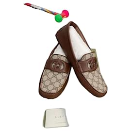 Mocassini Gucci in pelle monogram