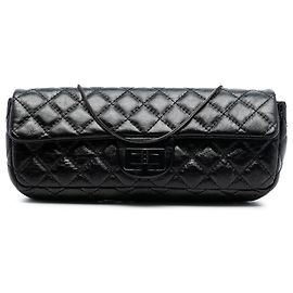 Clutch Chanel in pelle di vitello lucida trapuntata nera Reissue 2.55 con catena