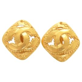 Orecchini a clip in metallo dorato con il logo Coco vintage di Chanel