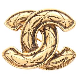 Spilla placcata in oro Chanel Coco Mark