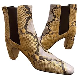 Botas Tory Burch estampado serpiente piel crema