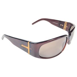 Occhiali da sole marroni con logo dorato vintage Gucci
