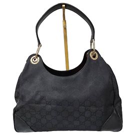 Bolsa de ombro 2 em 1 em lona GG Gucci em couro preto