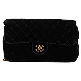 Zaino Chanel Matelassé 25 Coco Mark in velluto nero e pelle