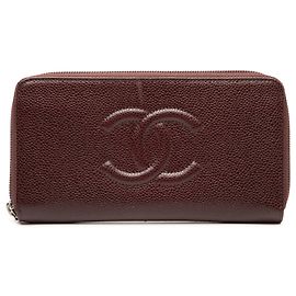 Cartera con cremallera Chanel CC Caviar roja