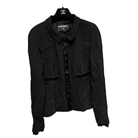 Giacca Chanel in lana nera con fodera in seta