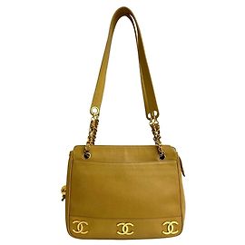 Borsa tote a catena in pelle caviar triplo Coco beige di Chanel