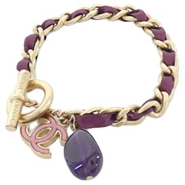 Bracciale charm oro e viola Chanel