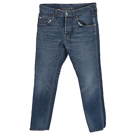 Jeans skinny in denim blu con logo G intrecciato Gucci