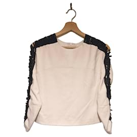Top blanco Sandro con detalles negros