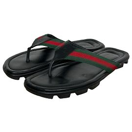 Sandali Gucci in pelle nera con banda Web
