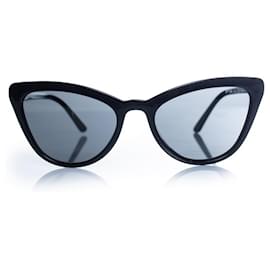 Lunettes de soleil cat eye Prada en noir