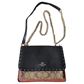 Borsa a spalla Coach in pelle nera e tela monogrammata