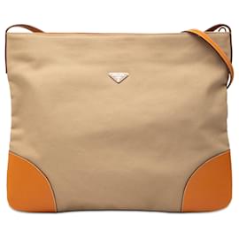 Borsa a tracolla Prada in tela beige con logo