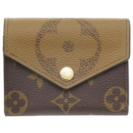 Louis Vuitton Portefeuille Zoe Tri-Fold Wallet