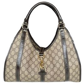 Sac Gucci Jackie en toile monogram beige et cuir marron