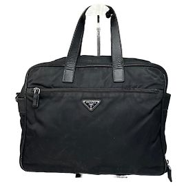 Borsa da viaggio in poliestere nera con logo triangolare vintage di Prada