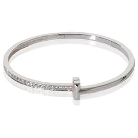 Bracciale a cerniera stretto Tiffany T T1 in oro bianco e diamanti Tiffany & Co.