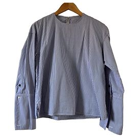 Céline Camisa listrada azul e branca