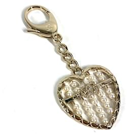 Portachiavi in metallo dorato Chanel con cuore CC Coco