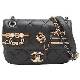 Borsa a tracolla classica in pelle trapuntata nera Chanel Mini Coco Clips