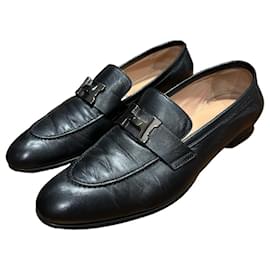 Mocassini in pelle nera Hermès con fibbia 'H'
