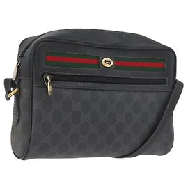 Bolso Sherry Line GG Supreme Web Gucci en PVC negro y dorado 72 02 088 Auth 170825A