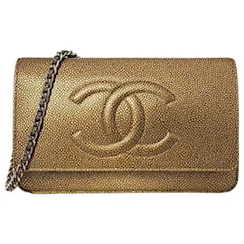 Cartera WOC Doble CC en caviar bronce metálico de Chanel