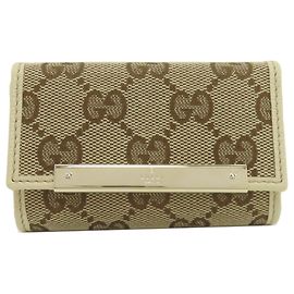 Gucci Schlüsselanhänger aus braunem Canvas und Leder