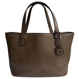 Borsa Lady Dollar in pelle martellata Gucci