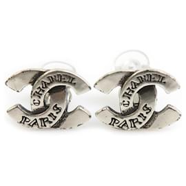 Boucles d'oreilles clips en métal argenté Chanel Coco Mark