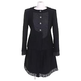 Conjunto de dois peças em tweed de algodão com botões COCO da Chanel