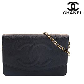 Bolsa de ombro em pele caviar preta Chanel com corrente