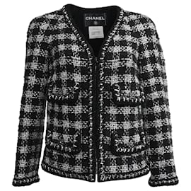 Chaqueta de tweed con cremallera de Chanel en lana negra y blanca