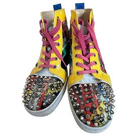 Sneakers alte "Lou Spikes" di Christian Louboutin