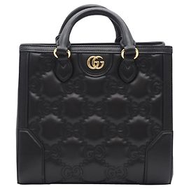 Gucci GG gesteppte Lederhandtasche