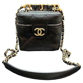 Chanel Custodia cosmetica in metallo dorato con logo CC, borsa a catena piccola:
