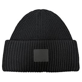 Berretto in lana lavorato a maglia con grande patch logo Acne