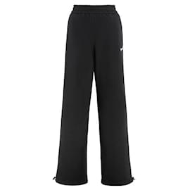 Pantalones de chándal de pierna ancha con logo - Versace