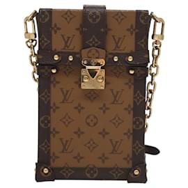 Pochette Trunk Verticale Louis Vuitton in Tela Monogramma Inverso