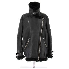 Acne Bomberjacke aus Leder und Wolle in Schwarz